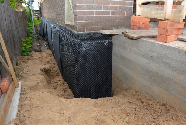 SJ Waterproofing Pros technician performing targeted Waterproofing assessment in Morral, OH